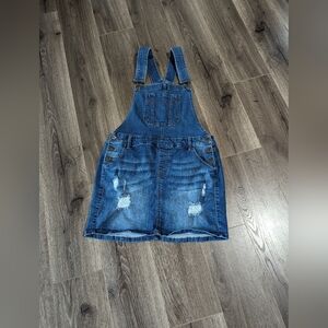 Wax Jean overall Skirt. Stretched denim Distressed. Size large. EUC.